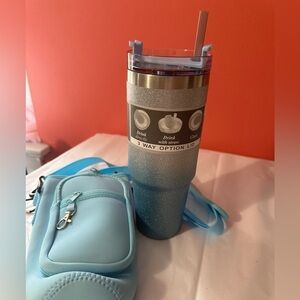 Travel mug with insulated bag with strap